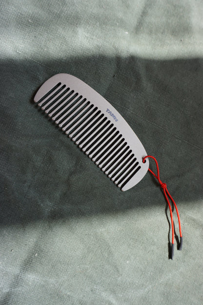 the TANN titanium comb 
